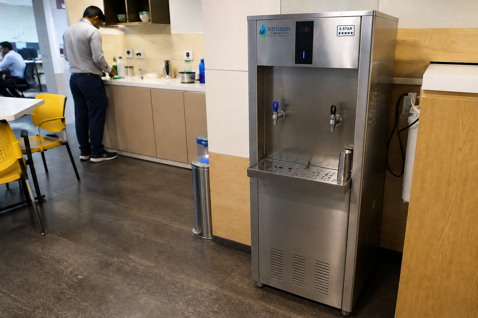 Commercial water cooler installed in an Indian office pantry.